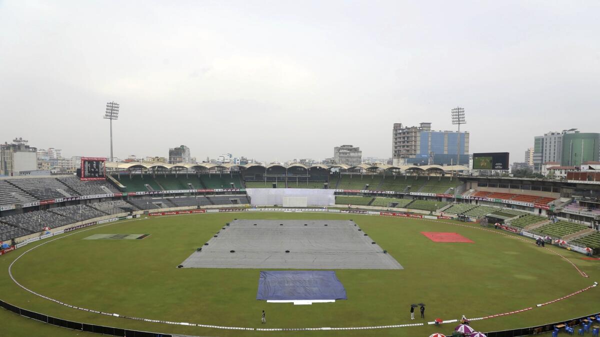 It was raining hard and the covers were firmly in place all day long. - AP