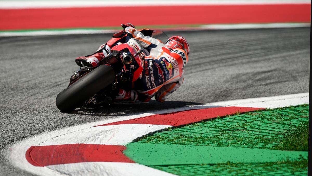 Marquez claims landmark MotoGP pole in style with record lap