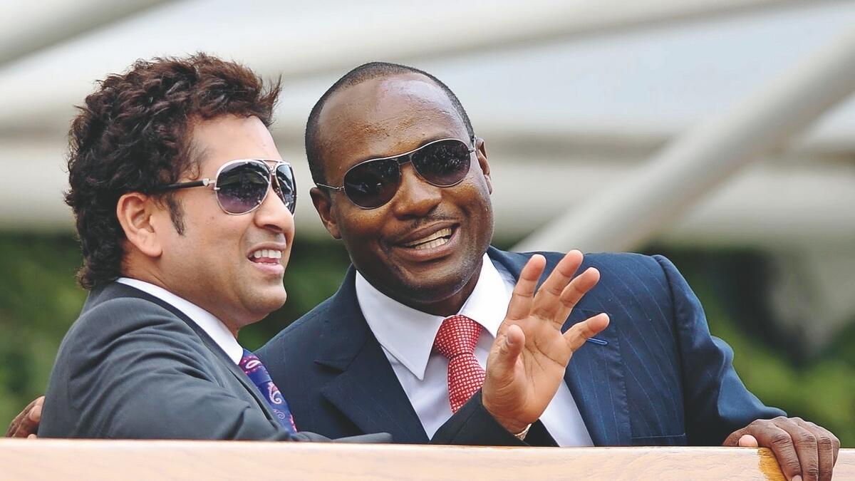 ICONS: Sachin Tendulkar and Brian Lara appealed to their fans to stay safe. - AFP