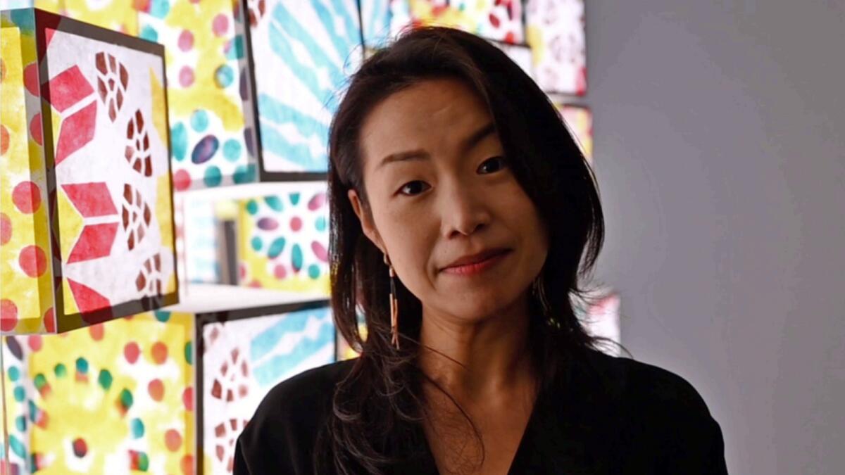 Ji-Hye Kim of South Korea with her artwork ‘Unity Prayers’. She said her focus is the theme of revelation,  exploring different gradations through which she  seeks to attain a greater connection with the Creator.