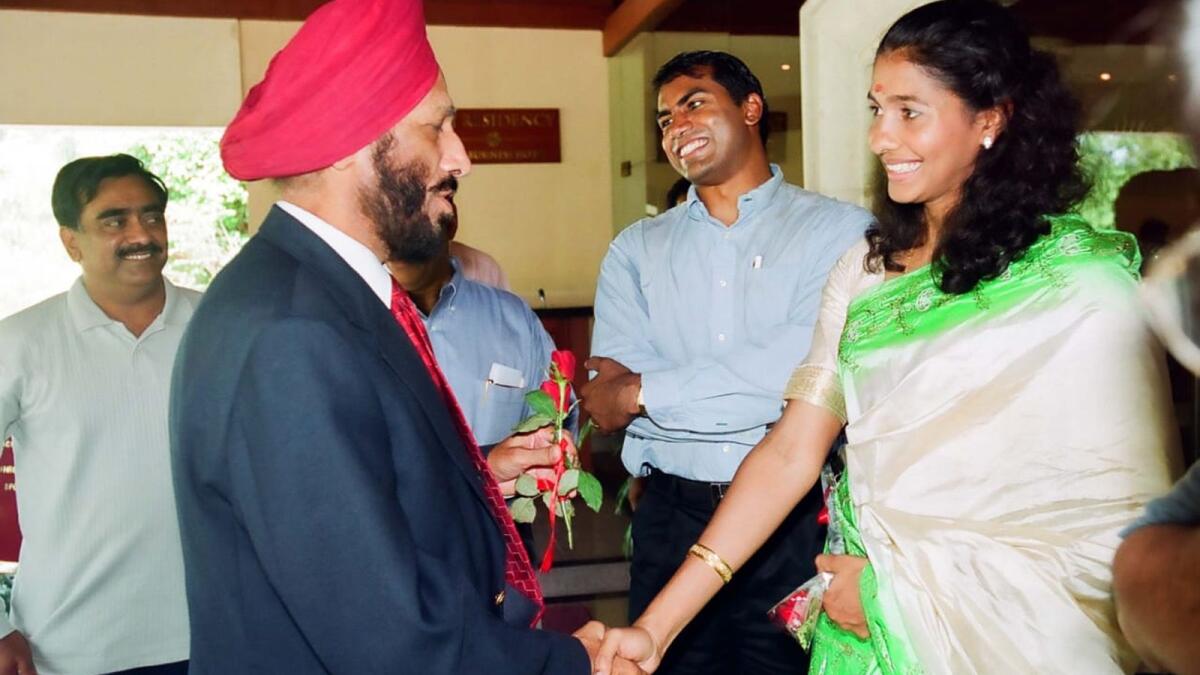 Anju Bobby George with Milkha Singh in  in Kannur, Kerala. (Supplied photo)