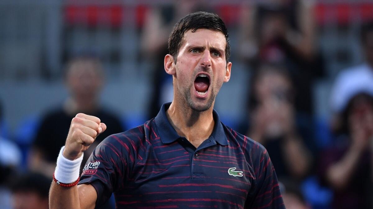 Djokovic eases past Goffin to set up Tokyo final with Millman