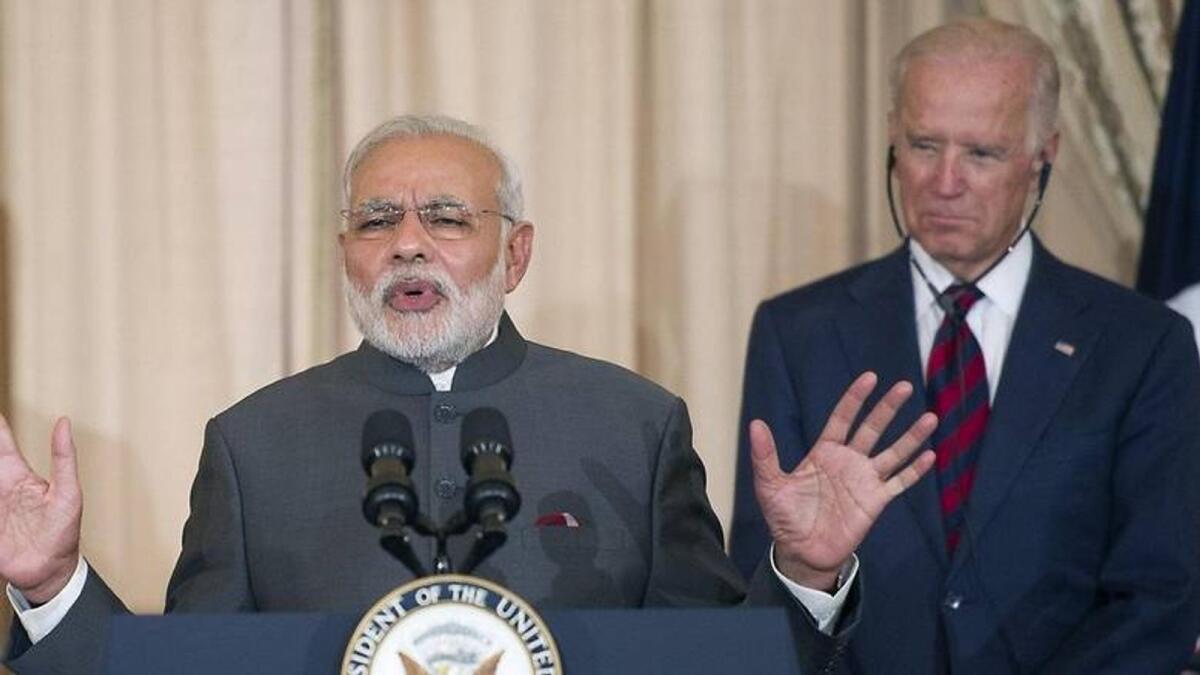 Joe Biden with Narendra Modi in 2014. — AP file