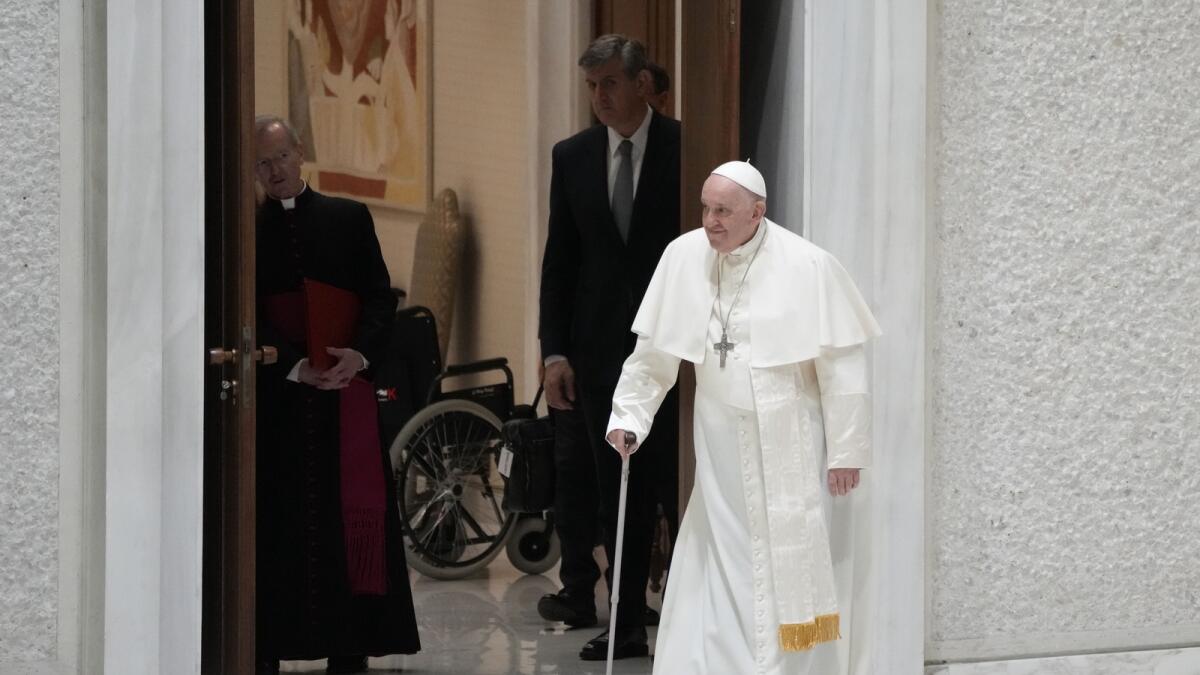 Pope Francis arrives for an audience with pilgrims from Rho diocese, in the Paul VI Hall, at the Vatican, on Saturday, March 25, 2023. - AP