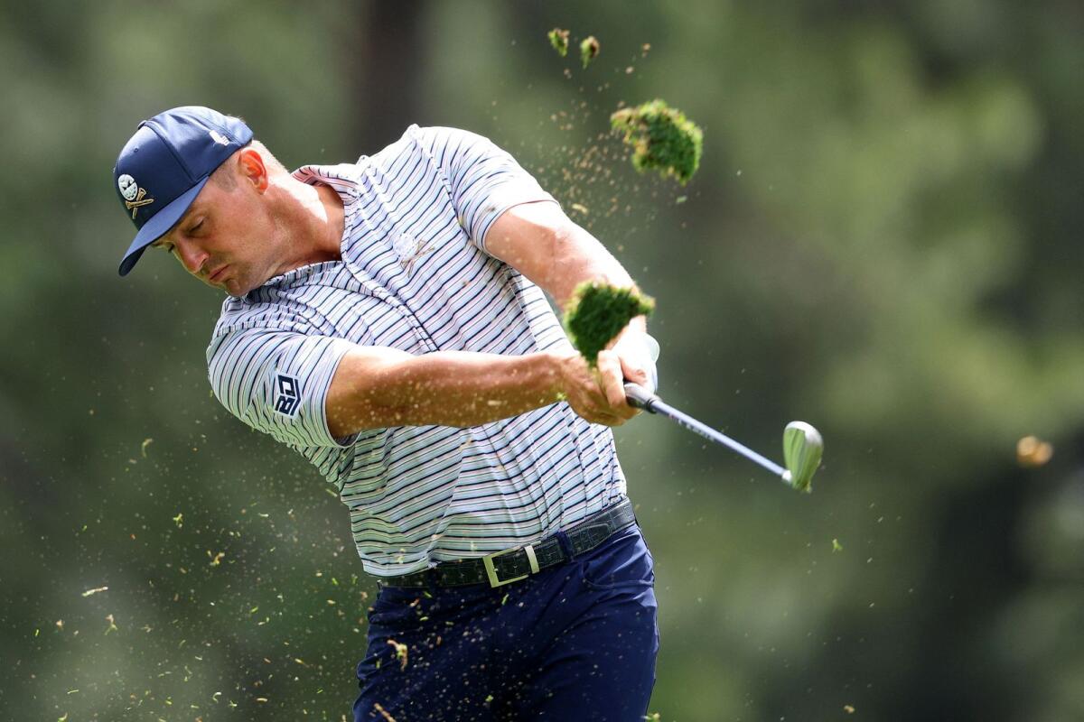 ryson DeChambeau of the United States plays his shot from the fourth tee during the first round of the 2024 Masters Tournament at Augusta National Golf Club on Thursday. - AFP