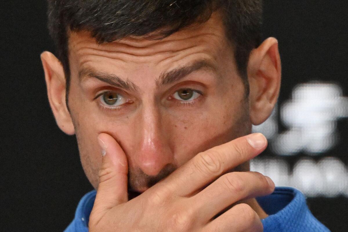Serbia's Novak Djokovic attends a press conference after losing to Italy's Jannik Sinner. - AFP