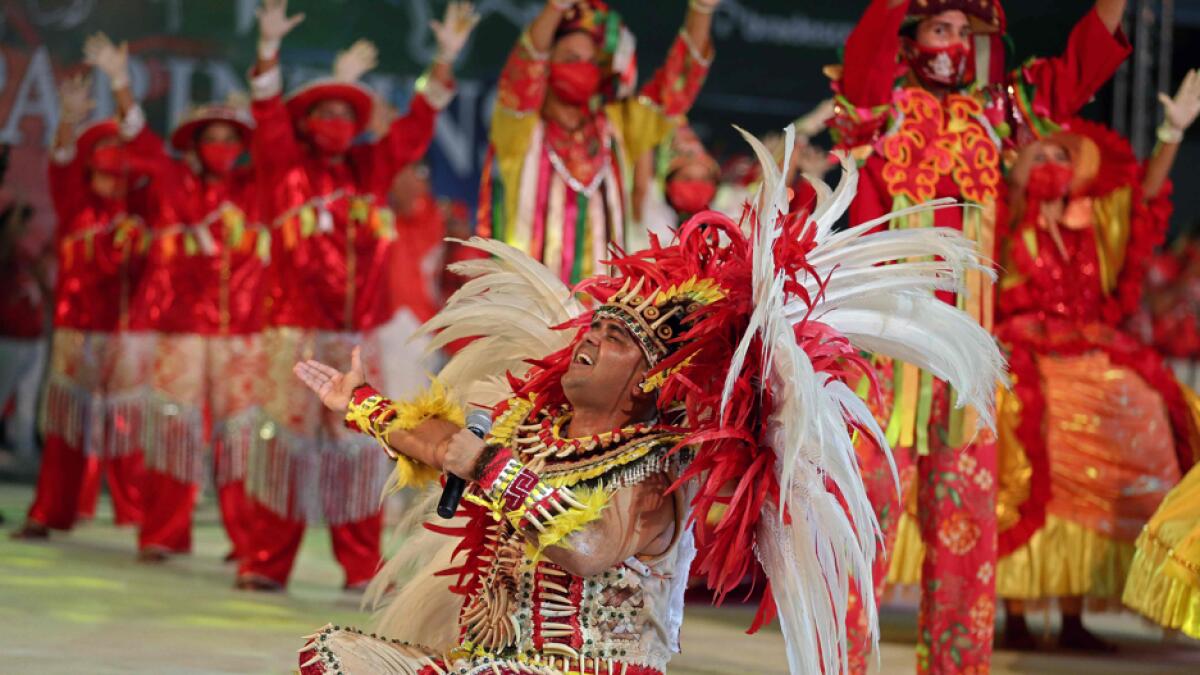 Dancers perform for a live streaming replacing the traditional Boi-Bumba folklore festival, cancelled amid the new coronavirus pandemic in Parintins, Amazonas state, Brazil, on June 27, 2020. Parintins is well-known internationally for its Boi-Bumba folklore festival, which lasts for three days in late June. Photo: AFP
