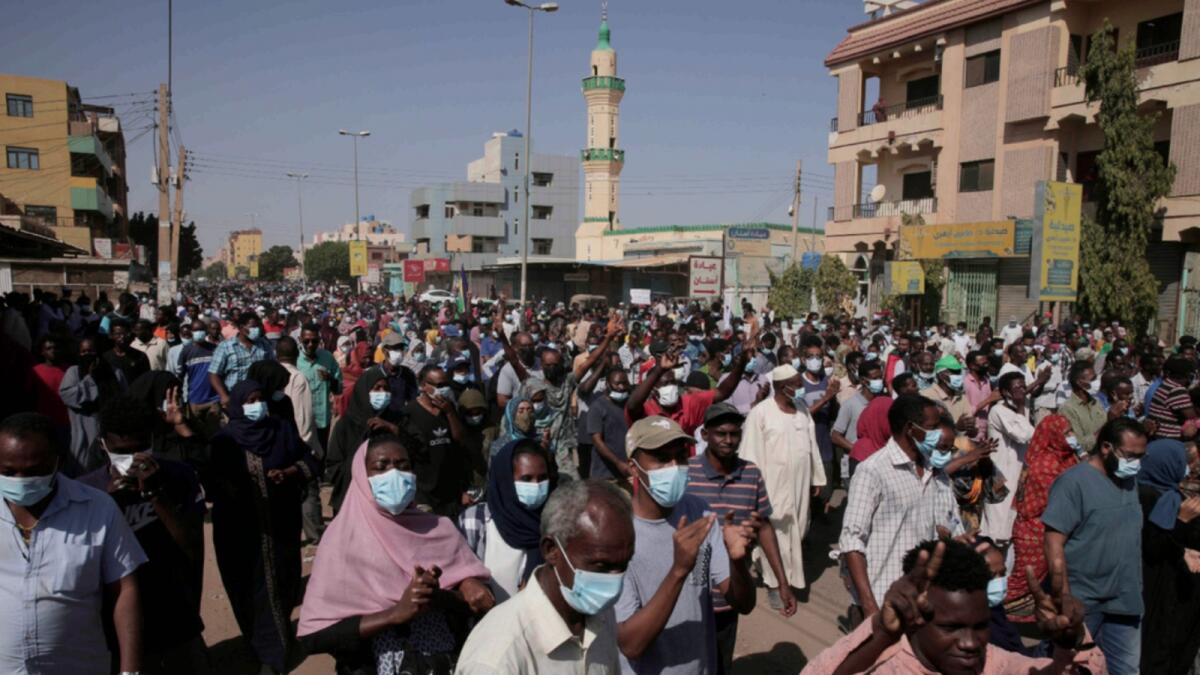 People protest in Khartoum, Sudan. — AP