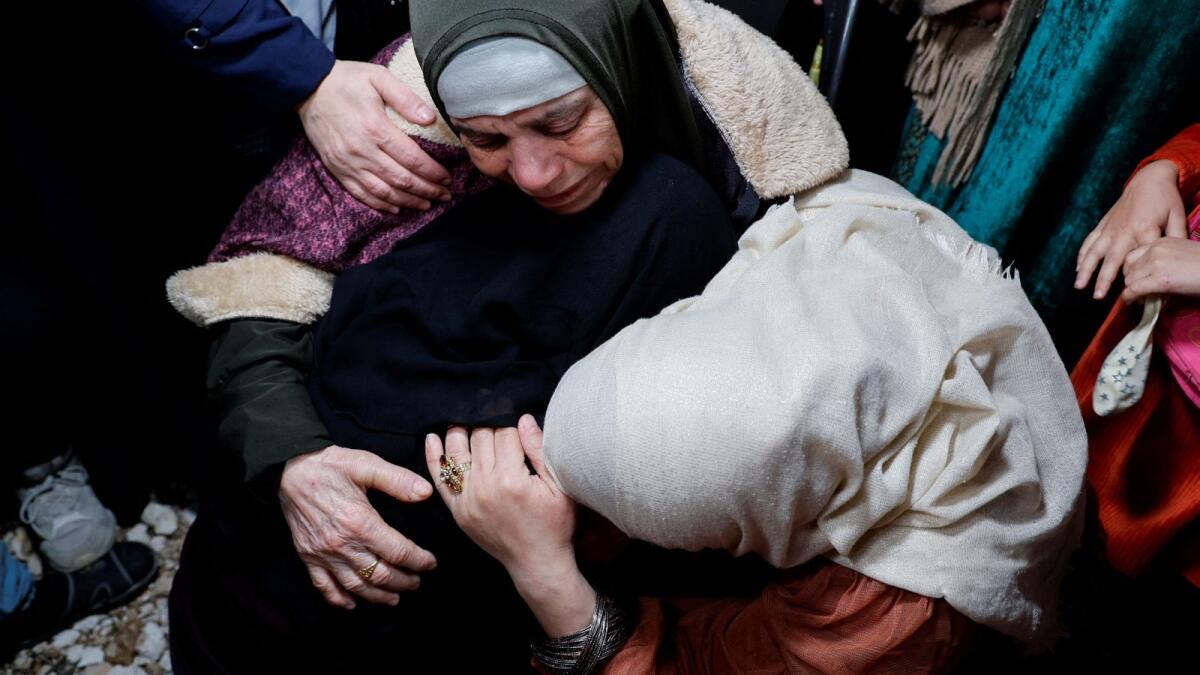 Family members react as they welcome released Palestinian prisoner Fatima Amarneh. Reuters