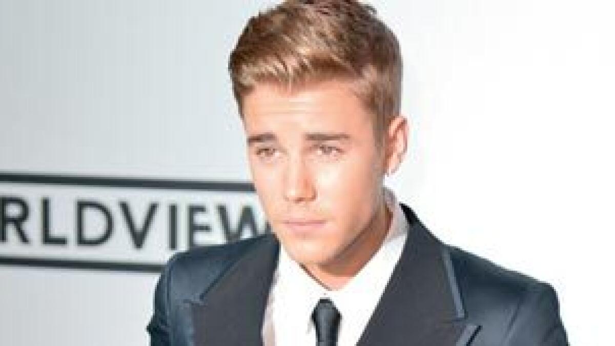 Justin Bieber visited by police officials
