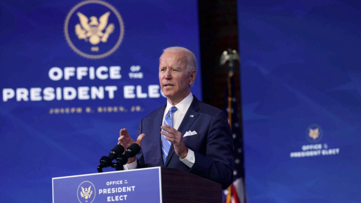 Joe Biden lays out his plan for combating the coronavirus and jump-starting the nation's economy at the Queen theatre in Wilmington, Delaware.— AFP
