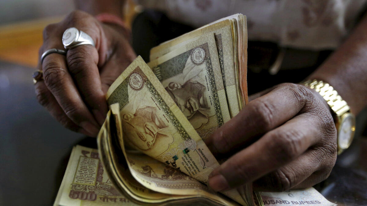 Indian rupee to stay under pressure from surging greenback