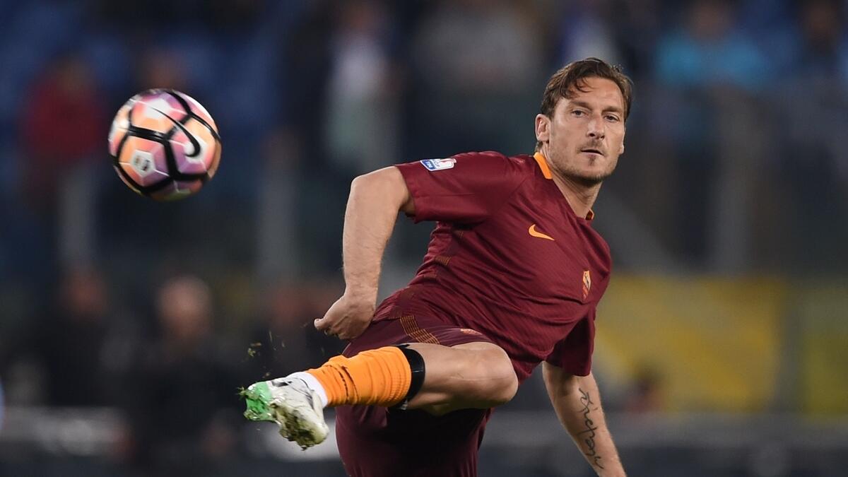 Veteran Totti set to start on bench for Roma swansong