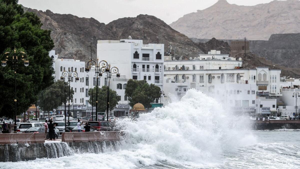 High waves break on the Mutrah sea side promenade in the Omani capital Muscat, as Cyclone Shahee hits the country. Photo: AFP