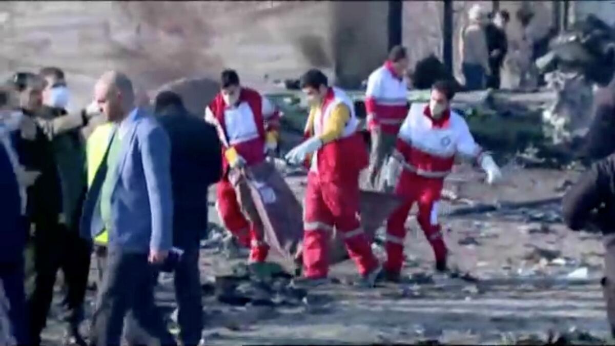 The plane, fully loaded with fuel for its 2,300-kilometer (1,430-mile) flight, slammed into farmland near the town of Shahedshahr on the outskirts of Tehran. Videos taken immediately after the crash show blazes lighting up the darkened fields before dawn.