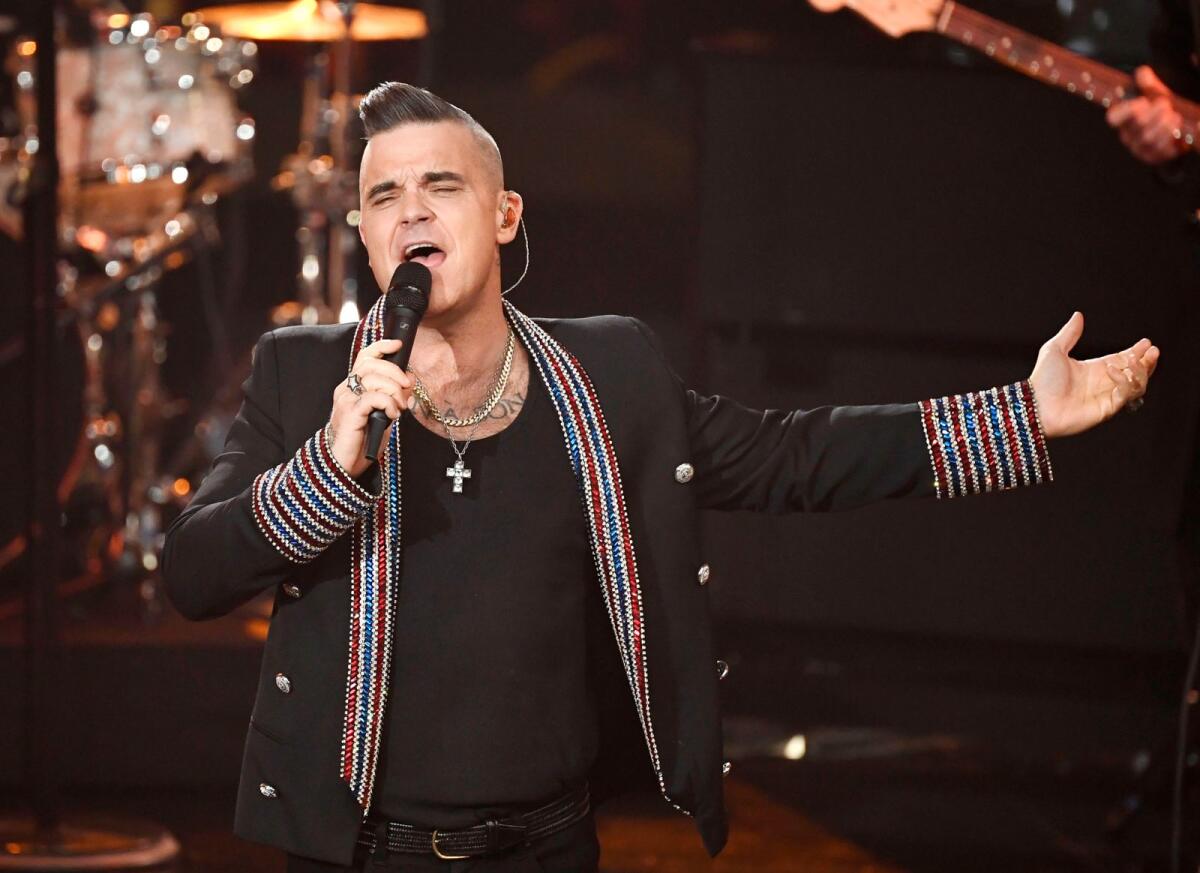 British singer Robbie Williams performs during the 'Ein Herz fuer Kinder' (A Heart for Children) charity gala in Berlin on December 7, 2019. Photo: AFP