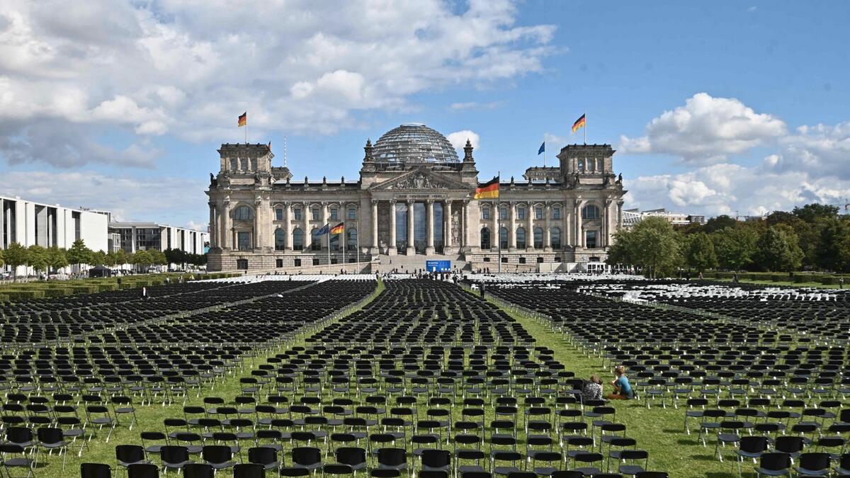 13,000 chairs are placed in front of the Reichstag building, seat of the German lower house of parliament Bundestag in Berlin, in an action to call for the evacuation of the Moria refugee camp on the Greek island of Lesbos. The chairs symbolically stand for people actually living in Moria, as well as for the space and the readiness of cities, federal states and the civil society to receive those refugees. The chair installation is taking place in the context of the anti-racist action days by 'We’ll Come United' and is organised by several groups such as Sea-Watch, Campact and LeaveNoOneBehind.  Photo: AFP