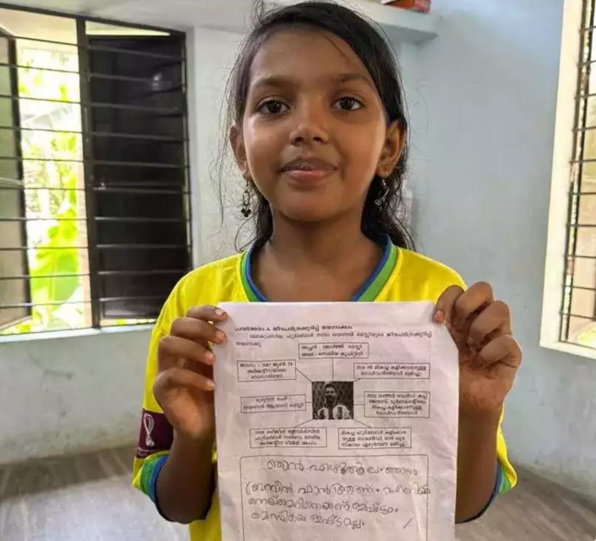 Risa Fathima with her answer sheet. — Photo courtesy: Twitter
