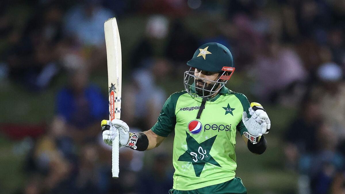 Pakistan batsman Mohammad Rizwan celebrates reaching his half century. (AFP)