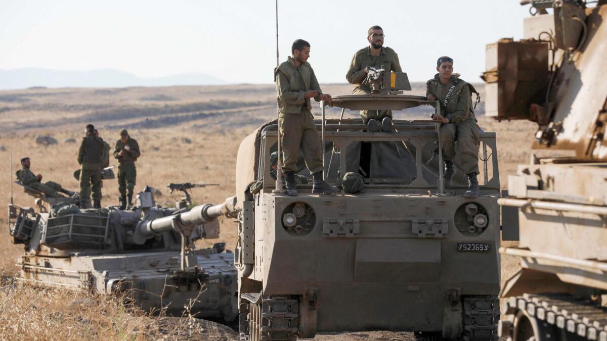 Israeli soldiers and military vehicles during a drill in the annexed Golan Heights earlier this year. — AFP file photo