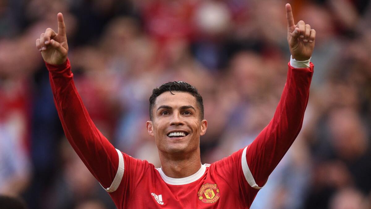 Manchester United's Cristiano Ronaldo celebrates after scoring a goal against Newcastle during the English Premier League match. — AFP