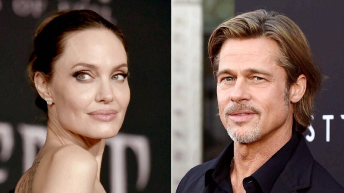 Angelina Jolie and Brad Pitt. — AP file