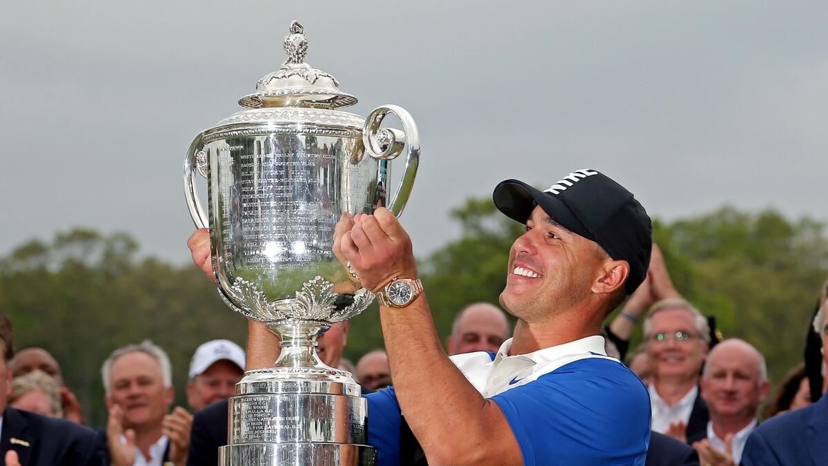 Brooks Koepka celebrates with the Wanamaker trophy after winning the 2019 PGA Championship. (AFP)