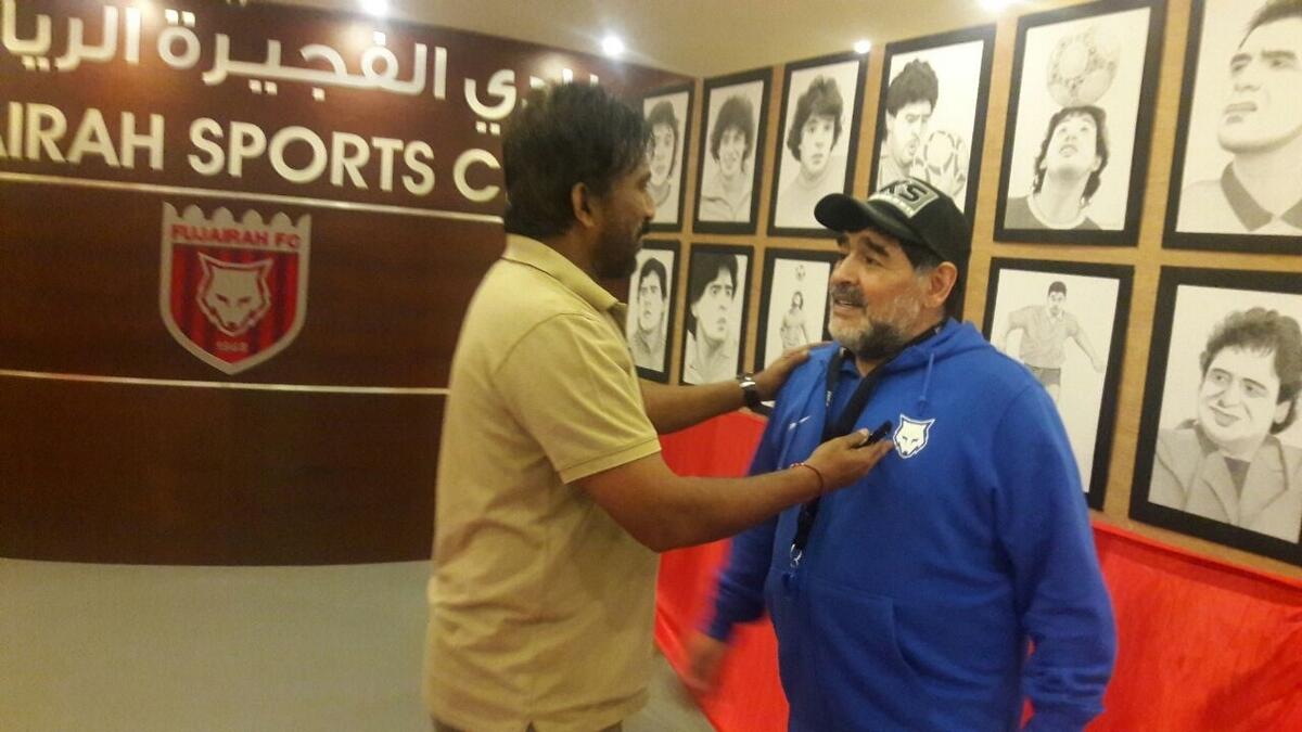 Artist visits Dubai just to meet Maradona, gift sketches