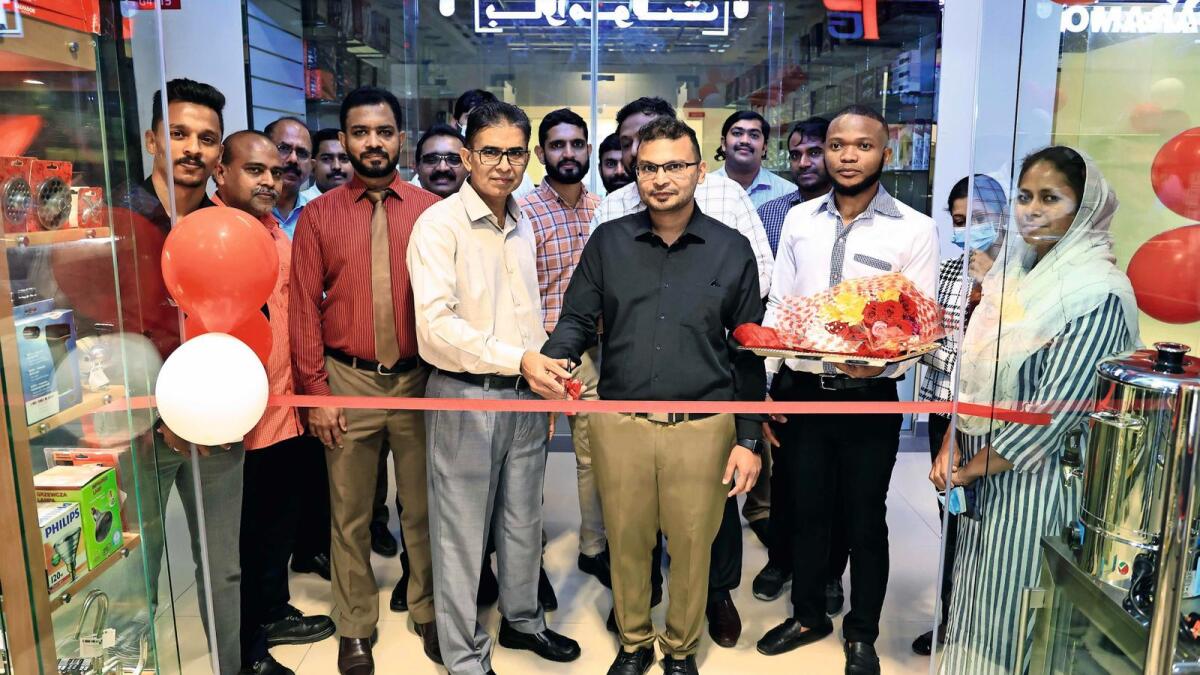 Hisham Shams, Executive Director, and Abdul Shukoor KV, Operations Director, jointly open Paramount’s new outlet at Yiwu Market, Jafza, in Dubai.