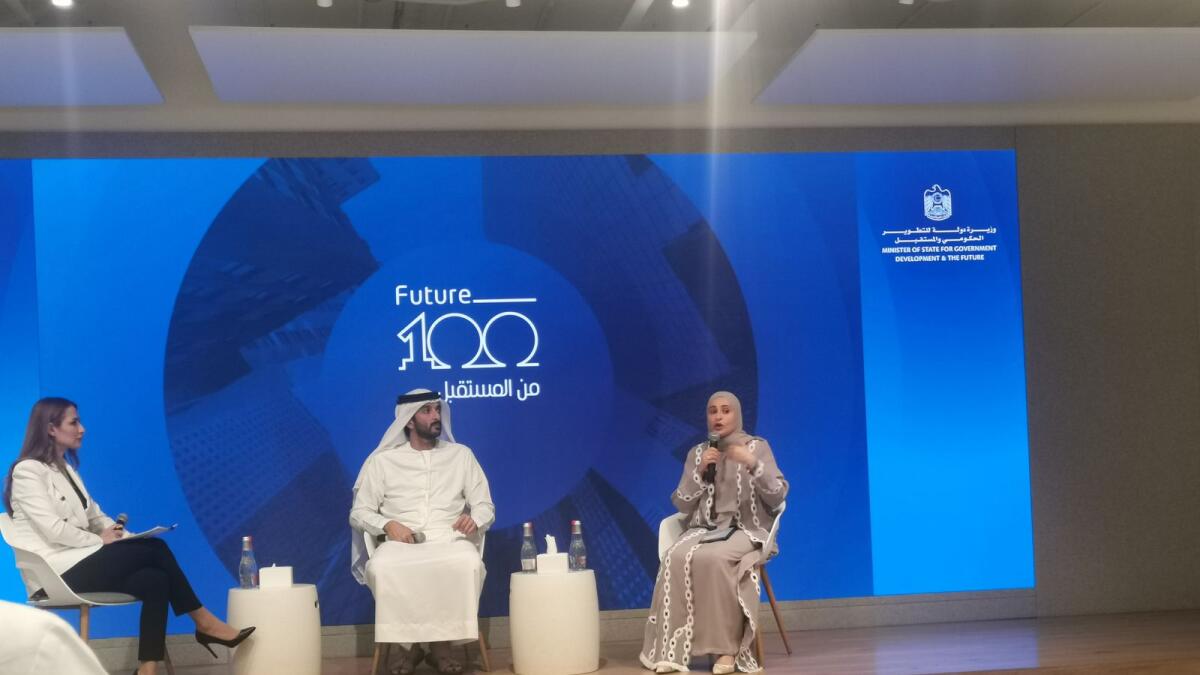 Abdulla bin Touq Al Marri and Ohood bint Khalfan Al Roumi address the press conference to launch “Future 100” initiative. –Supplied photo