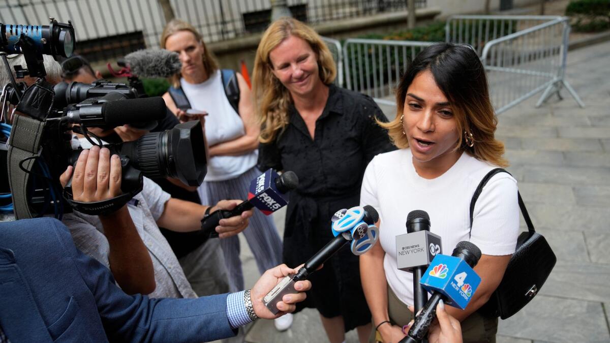 Sexual assault survivor Eva Santos Veloz speaks to members of the media after sentencing proceedings concluded for convicted sex offender Robert Hadden outside Federal Court on Tuesday. — AP
