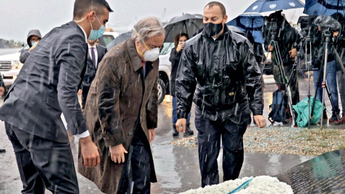 UN Secretary-General Antonio Guterres lays a wreath at the site of the port explosion that ravaged the Lebanese capital Beirut. — AFP