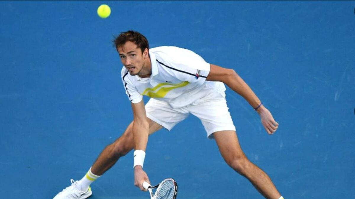 Daniil Medvedev hits a return during the semifinal on Friday. (Australian Open Twitter)