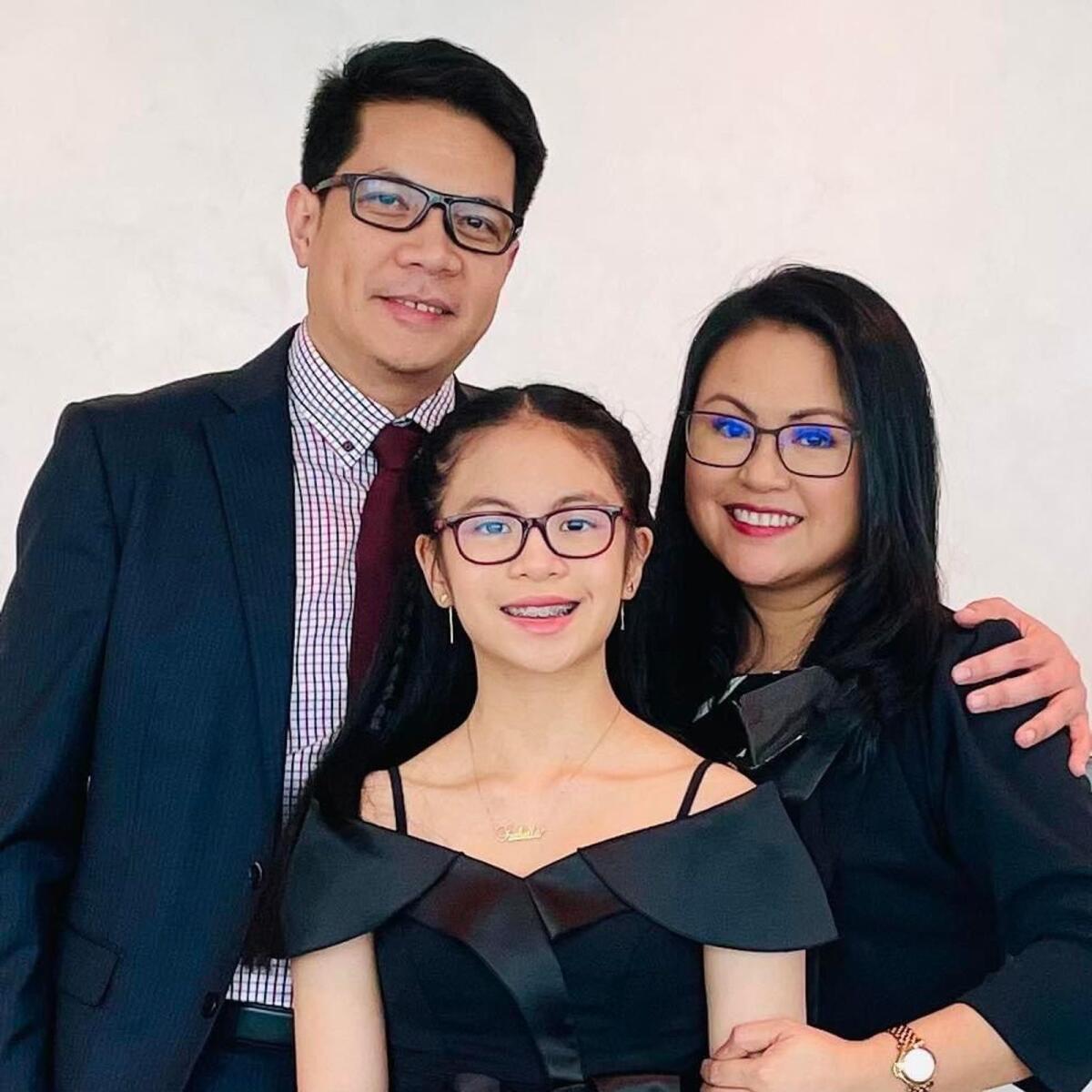 Filipino expat Ben Lebig with his wife and daughter. Photo: Supplied