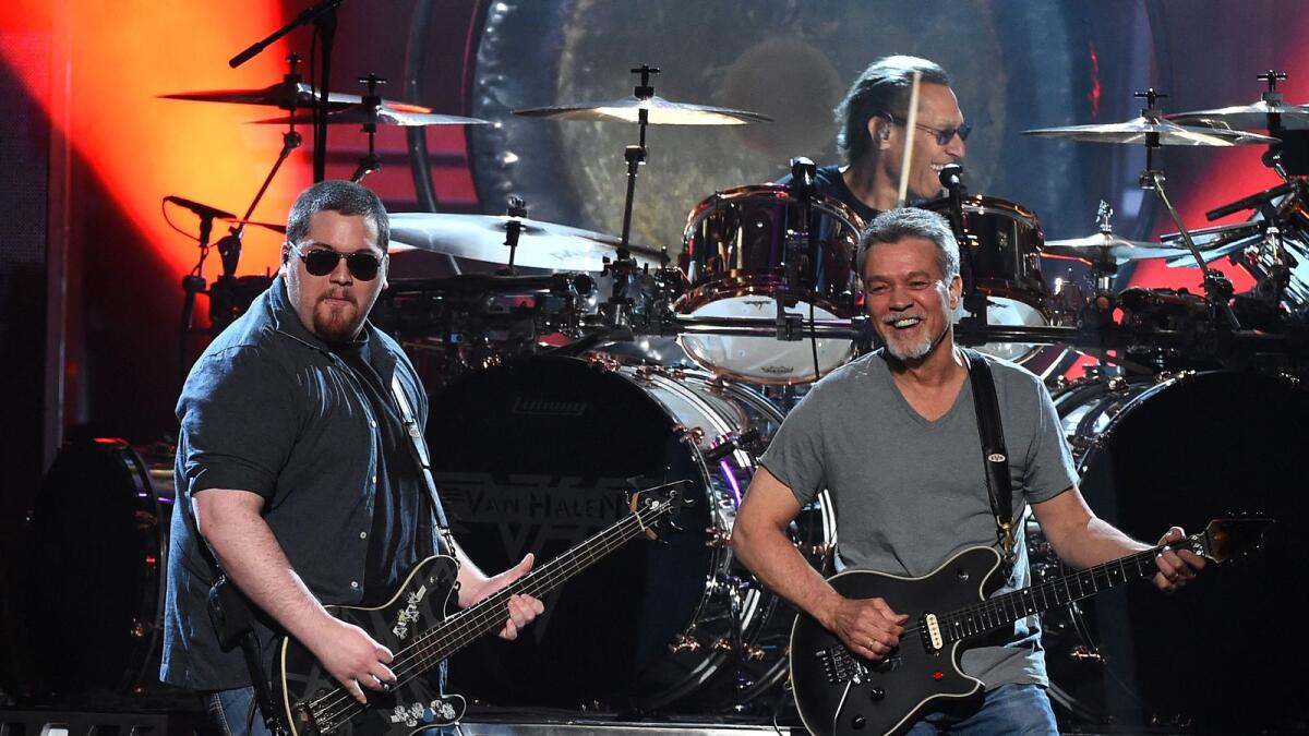 Wolfgang performs with his father Eddie Van Halen at the 2015 Billboard Music Awards. AFP file photo.
