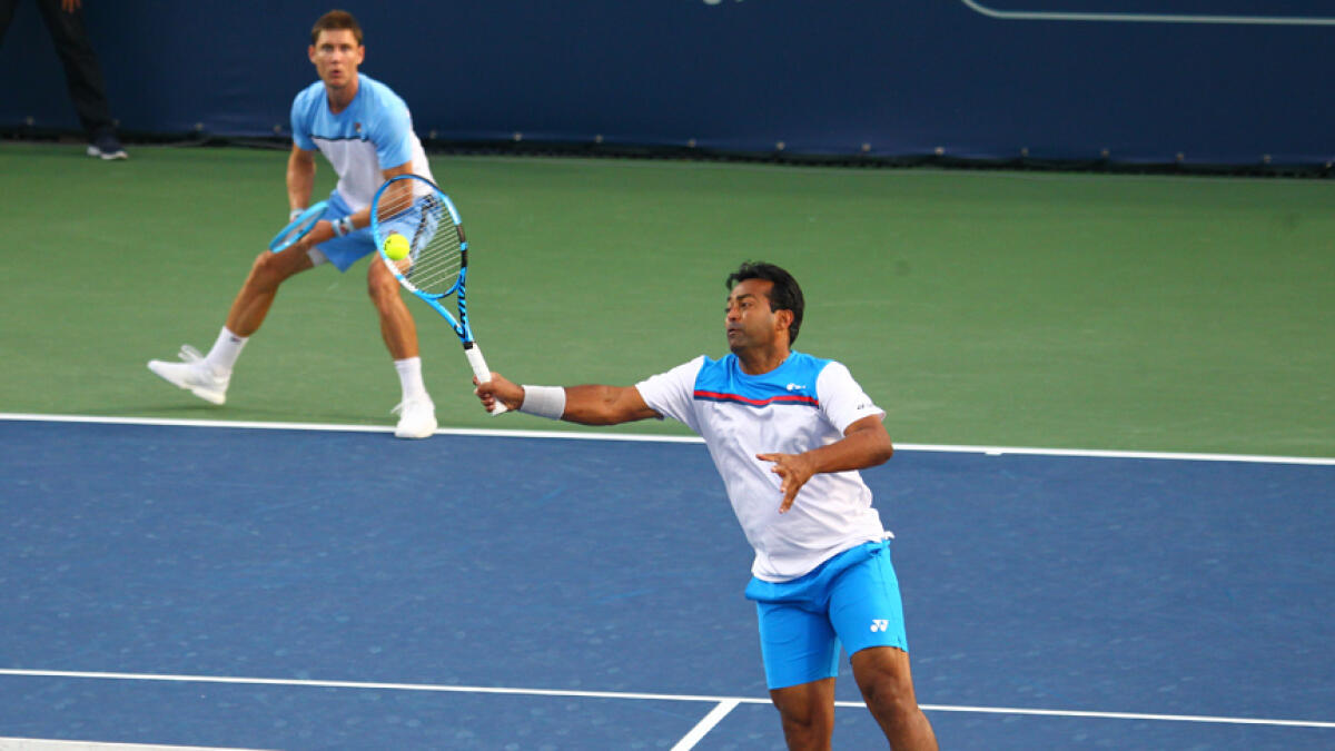 Paes and Ebden in action against Ivan Dodig and Filip Polasek. - Photo by Shihab