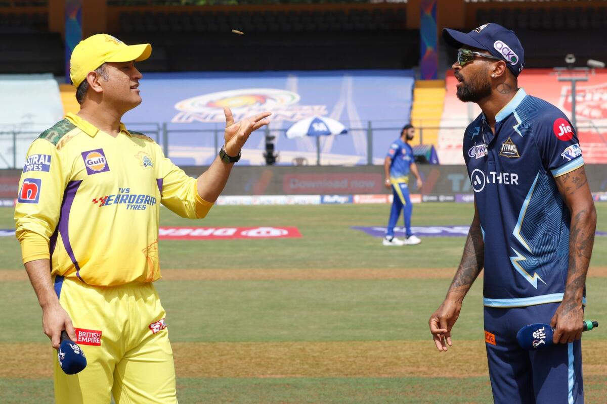 Chennai Super Kings captain MS Dhoni (left) and Gujarat Titans skipper Hardik Pandya. — IPL