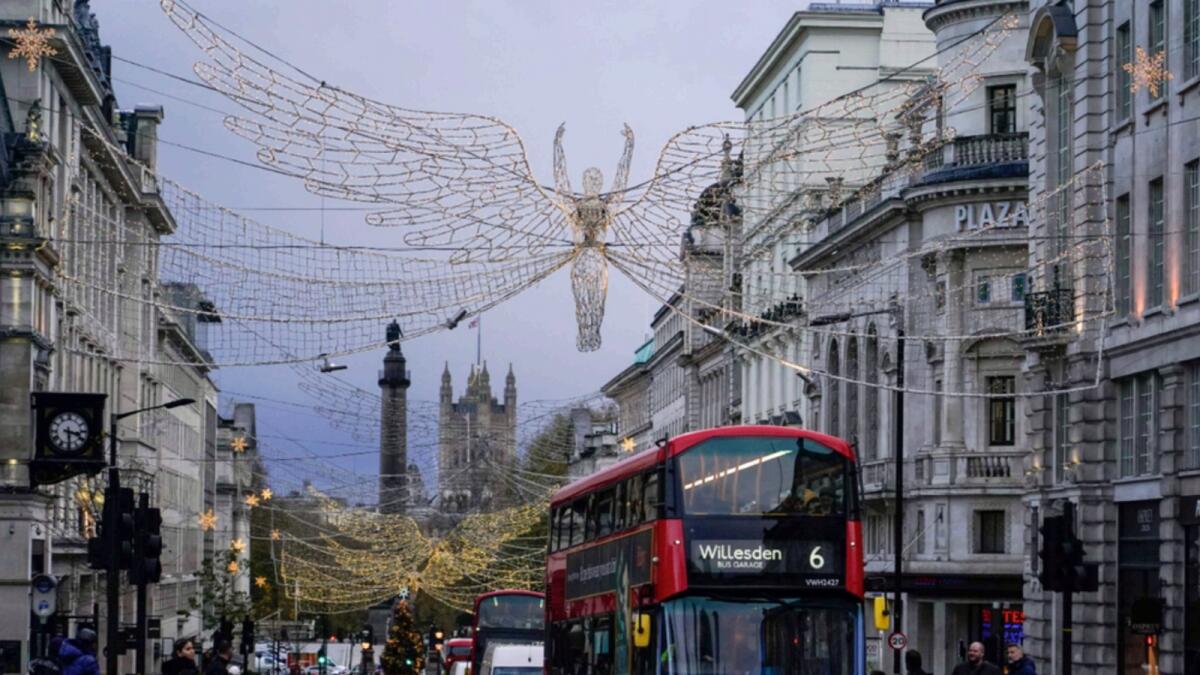 Christmas decorations are seen in central London. UK Health Secretary Sajid Javid told families to plan for Christmas “as normal”, despite new rules to combat the Omicron variant. — AP