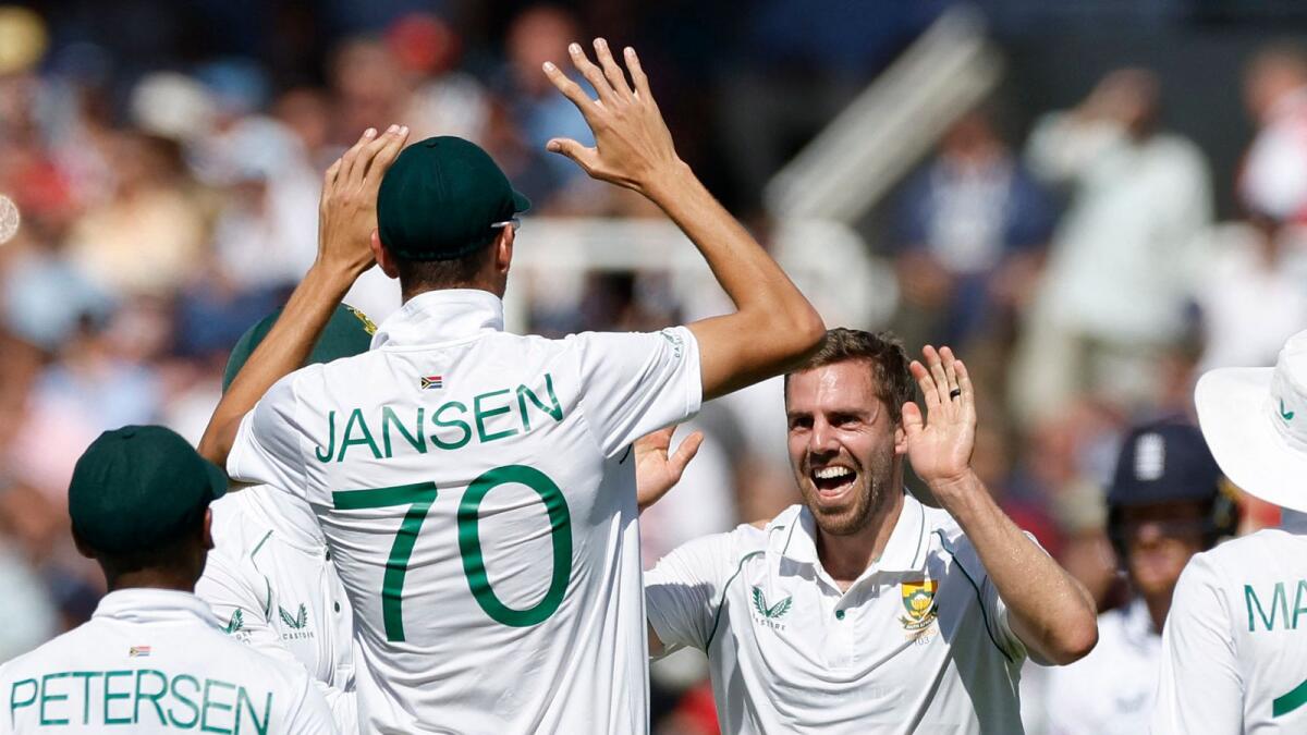 South Africa's Anrich Nortje celebrates with Marco Jansen after taking the wicket of England's Ben Foakes. (Reuters)