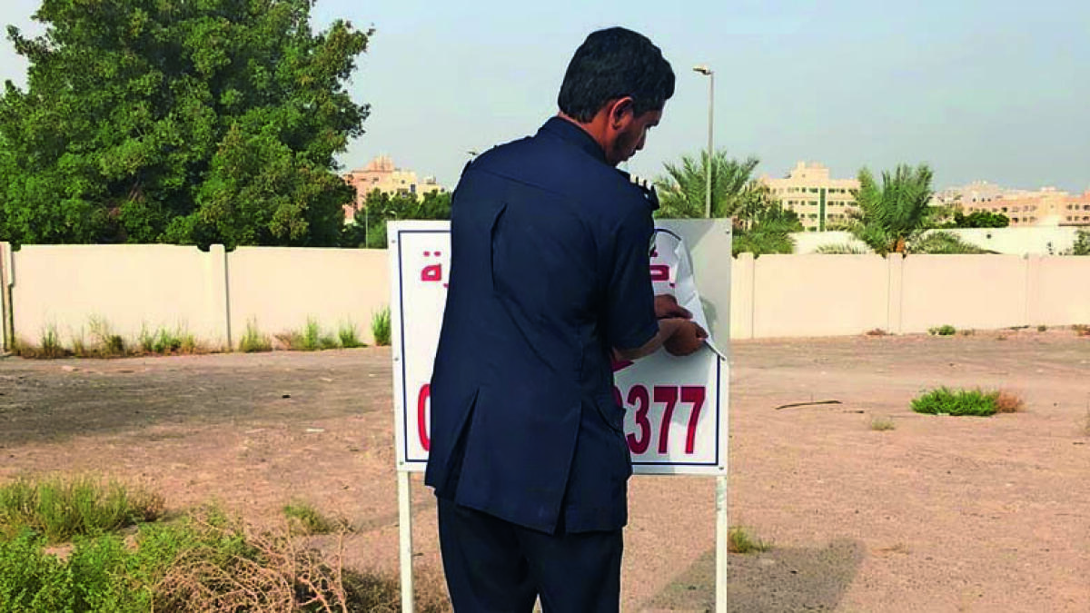 sharjah, illegal ads, inspection, city