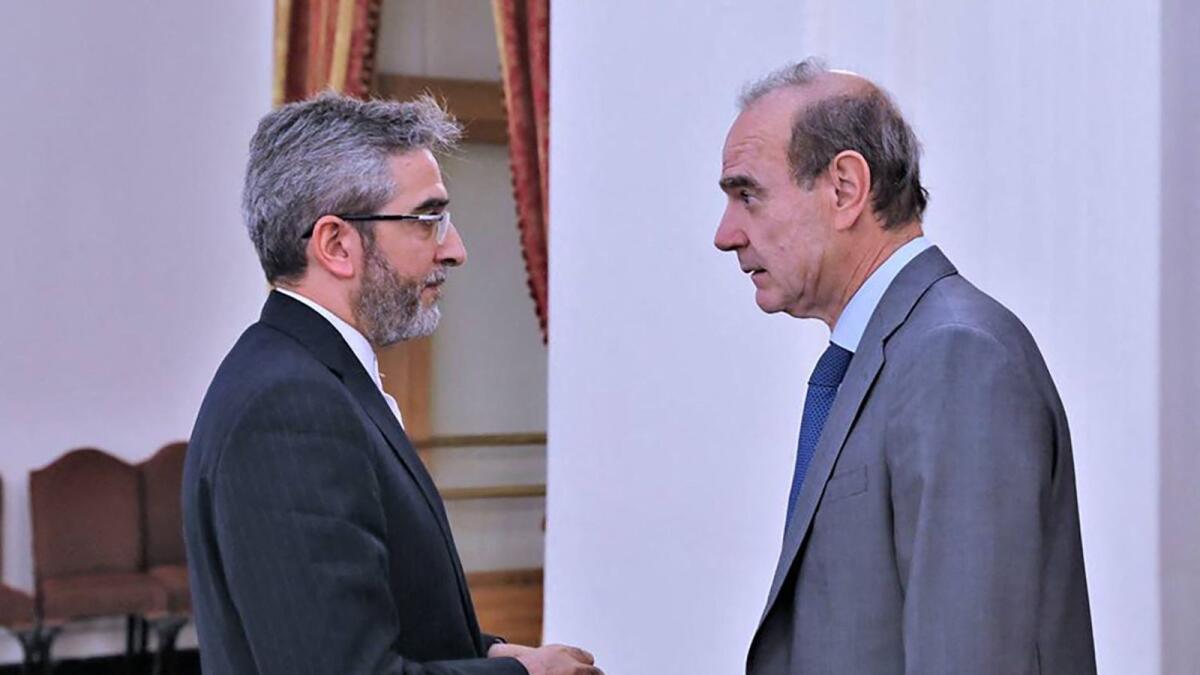 Enrique Mora (right), the EU coordinator of talks to revive Iran’s nuclear accord, with Iran’s top nuclear negotiator, Ali Bagheri Kani in Tehran (left)