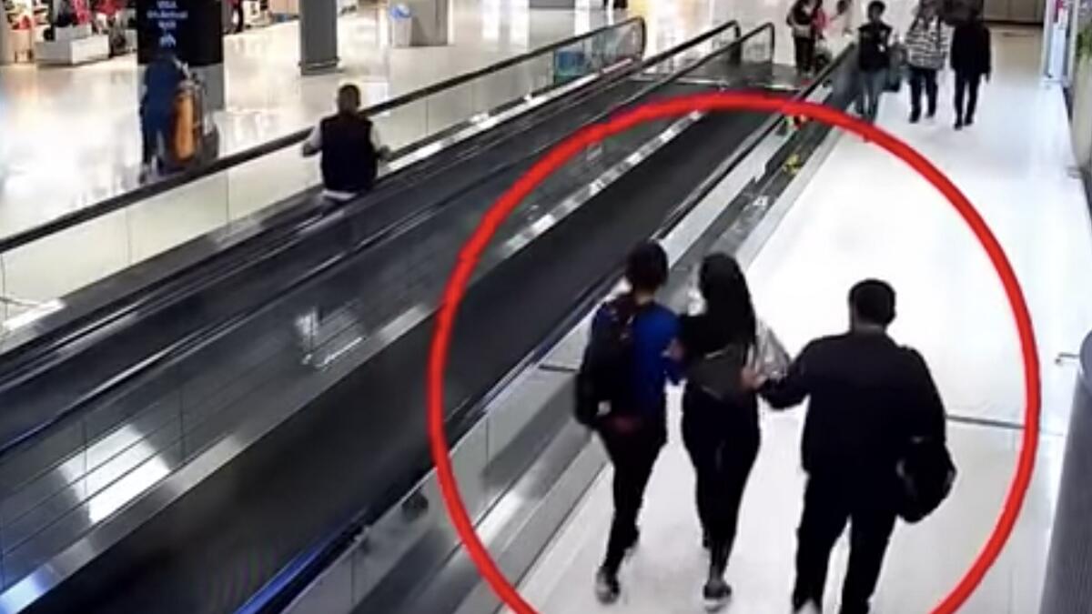 Video: Shocking CCTV footage shows gang of five kidnapping woman at crowded airport 