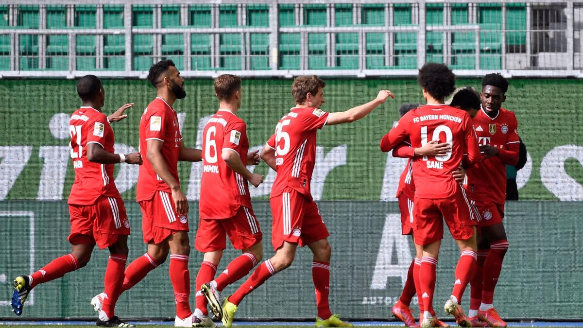 Bayern Munich's Jamal Musiala celebrates his goal with teammates. — Reuters