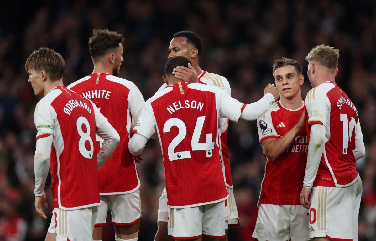 Arsenal's Reiss Nelson celebrate a goal with teammates. — Reuters