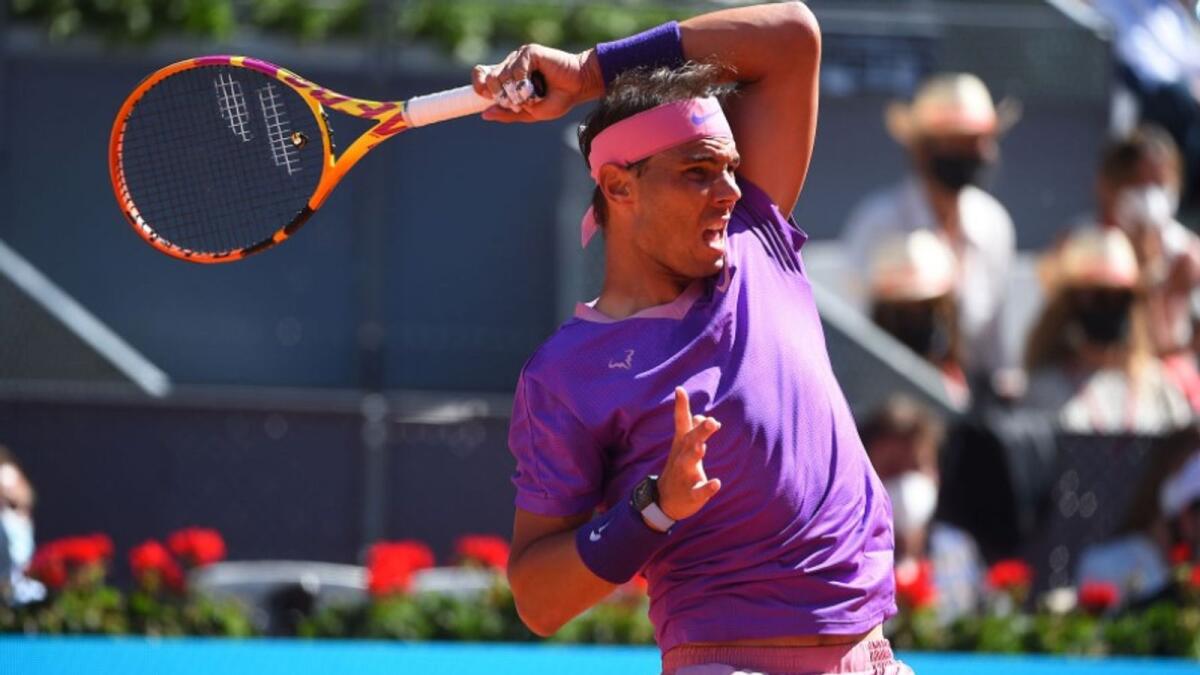 Rafael Nadal hits a backhand return. (ATP Twitter)