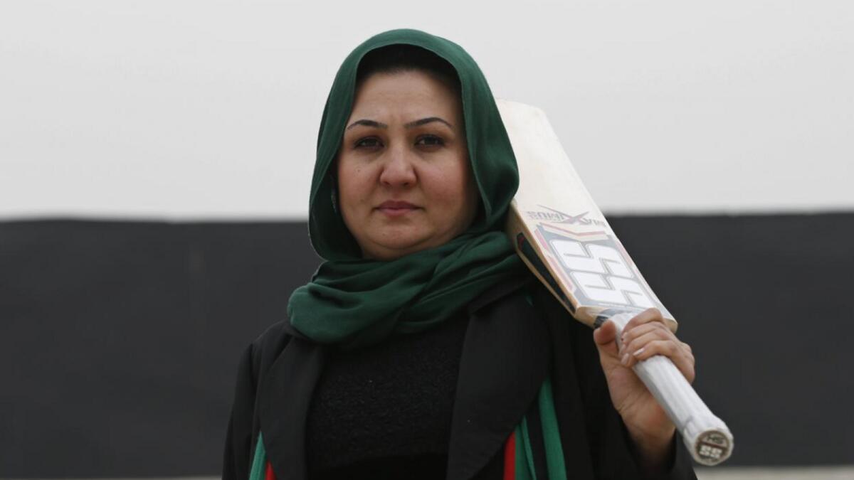 The founder of the national women's team, Afghan Diana Barakzai, poses for a picture at the Kabul Cricket Stadium in December 2014.  Credit - Reuters
