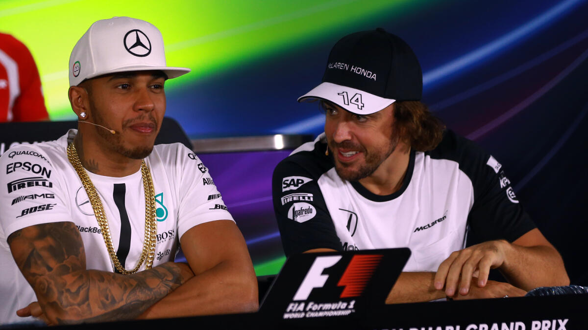 Lewis Hamilton and Fernando Alonso during the official Press conference for the Abu Dhabi Grand Prix on Thursday. 