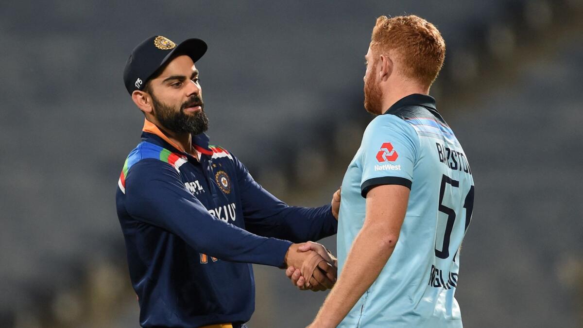 India's captain Virat Kohli shakes hands with England's Jonny Bairstow after the second one-day international (ODI) cricket match between India and England in Pune. Photo: AFP