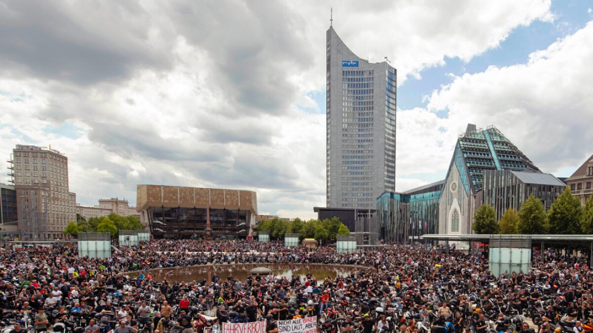 More than 10,000 people attend a demonstration against planned biker driving bans in Leipzig, eastern Germany, on Sunday, July 12, 2020. The background of the nationwide biker protests are demands by the Federal Council to reduce motorcycle noise. Photo: AP