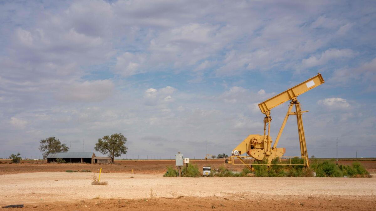 An oil pumpjack is seen in a field near the Eco Stream refinery in Stanton, Texas. — AFP